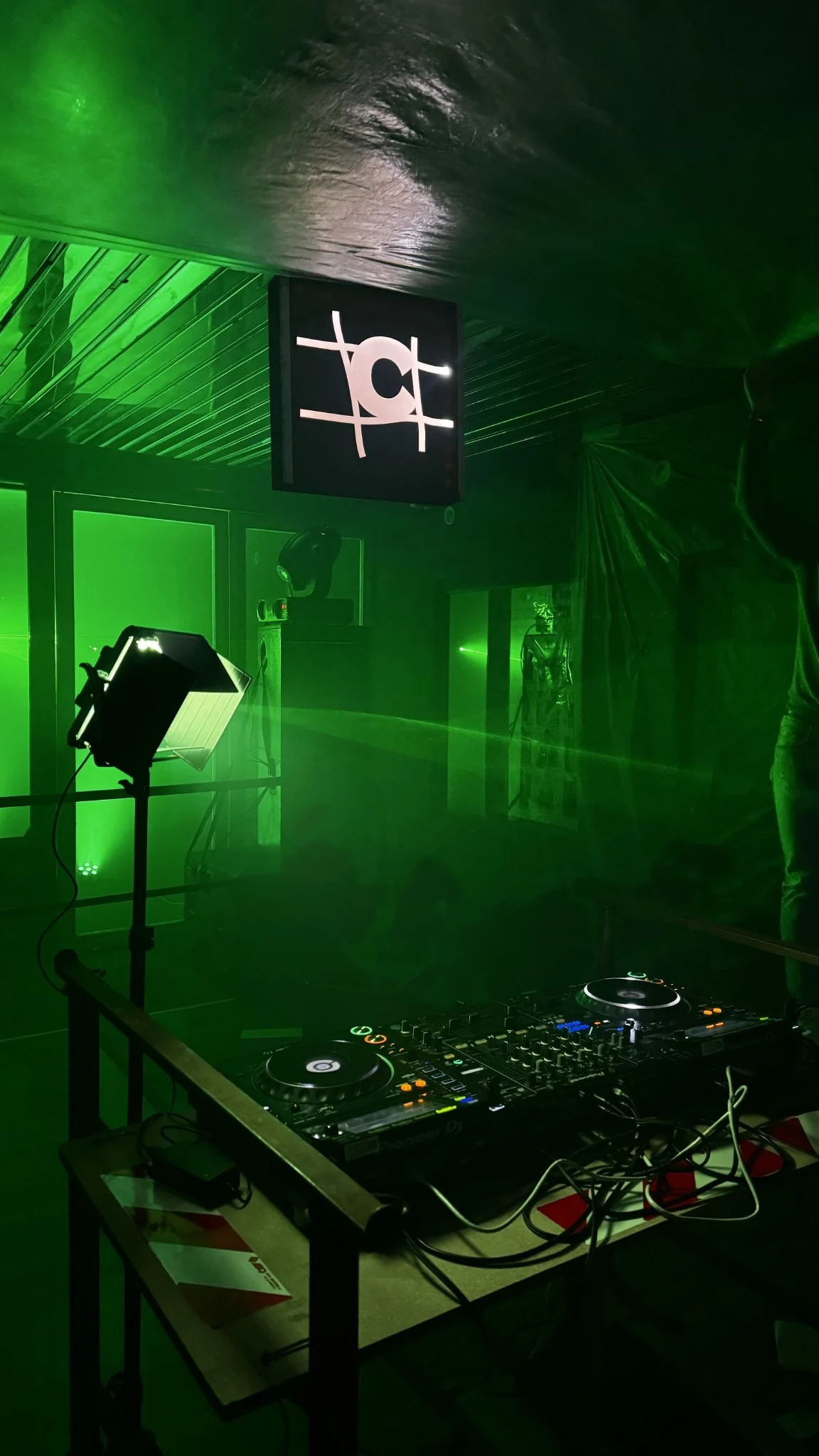 DJ booth and COLLAPSE symbol during Chaos as Duality