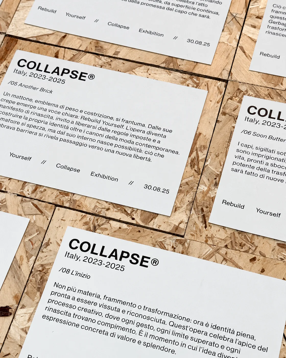 COLLAPSE exhibition texts printed and mounted on OSB panels