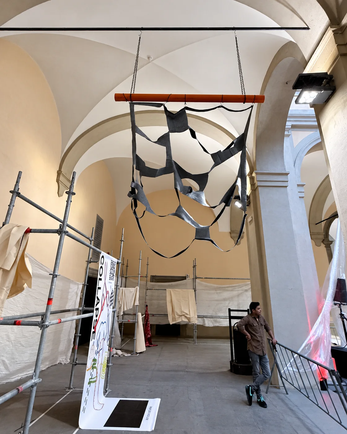 Suspended textile installation beneath the vaults of Palazzo Bufalini